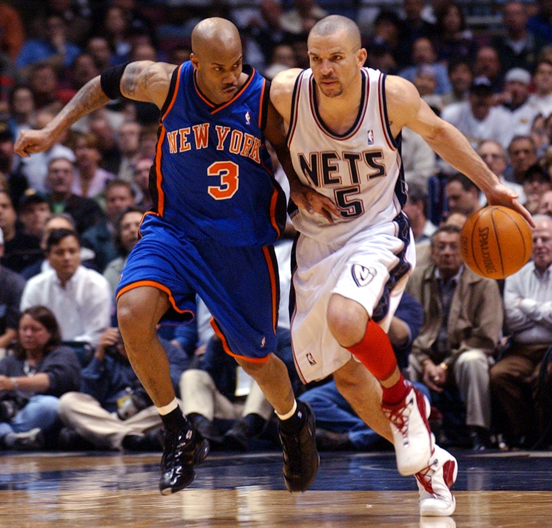 Jason Kidd of the New Jersey Nets brings the ball upcourt during