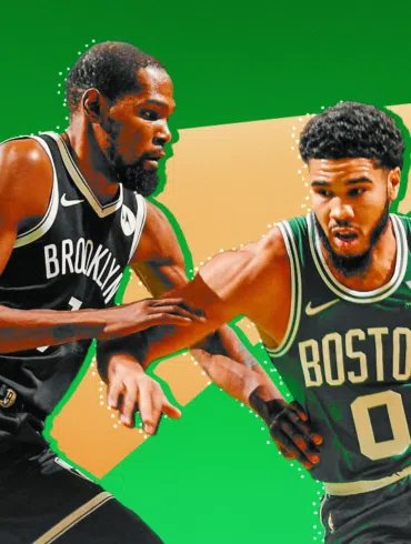 Brooklyn Nets forward Kevin Durant guards Jayson Tatum of the Boston Celtics.