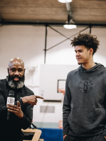 Jacque Vaughn and Cam Johnson of the Brooklyn Nets